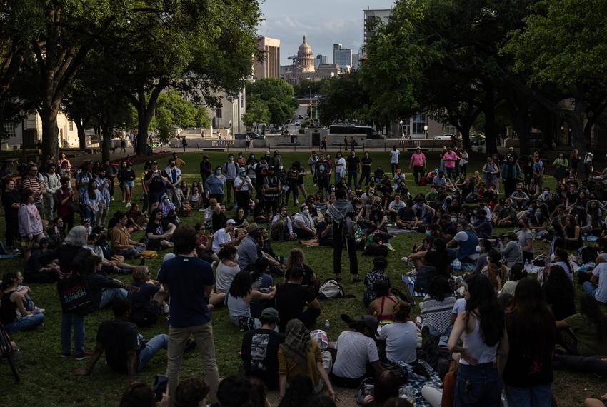 University of Texas at Austin students and other pro-Palestine supporters peacefully gather on the South lawn of UT campus following a heated demonstration where over 30 demonstrators were arrested by Texas Department of Public Safety Troopers and university police Wednesday, April 24, 2024, in Austin.
